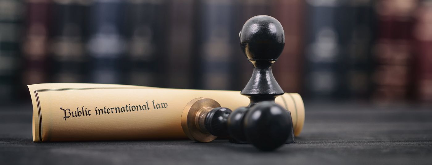 Rolled international law document with an official seal, representing apostille certification
